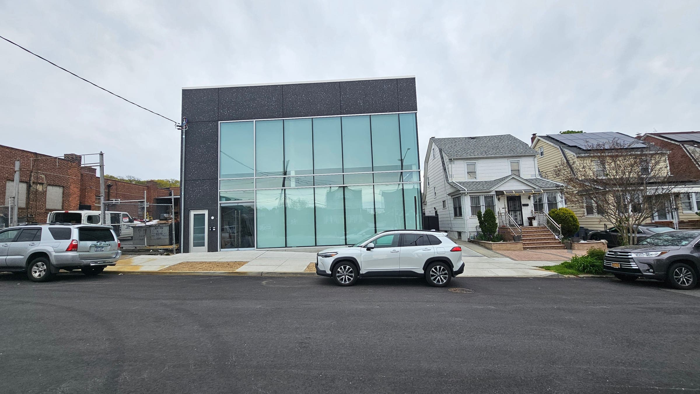 Kabinet King Showroom — Kabinet King Showroom — completed two-story glass-and-stone storefront at 8815 Hollis Court