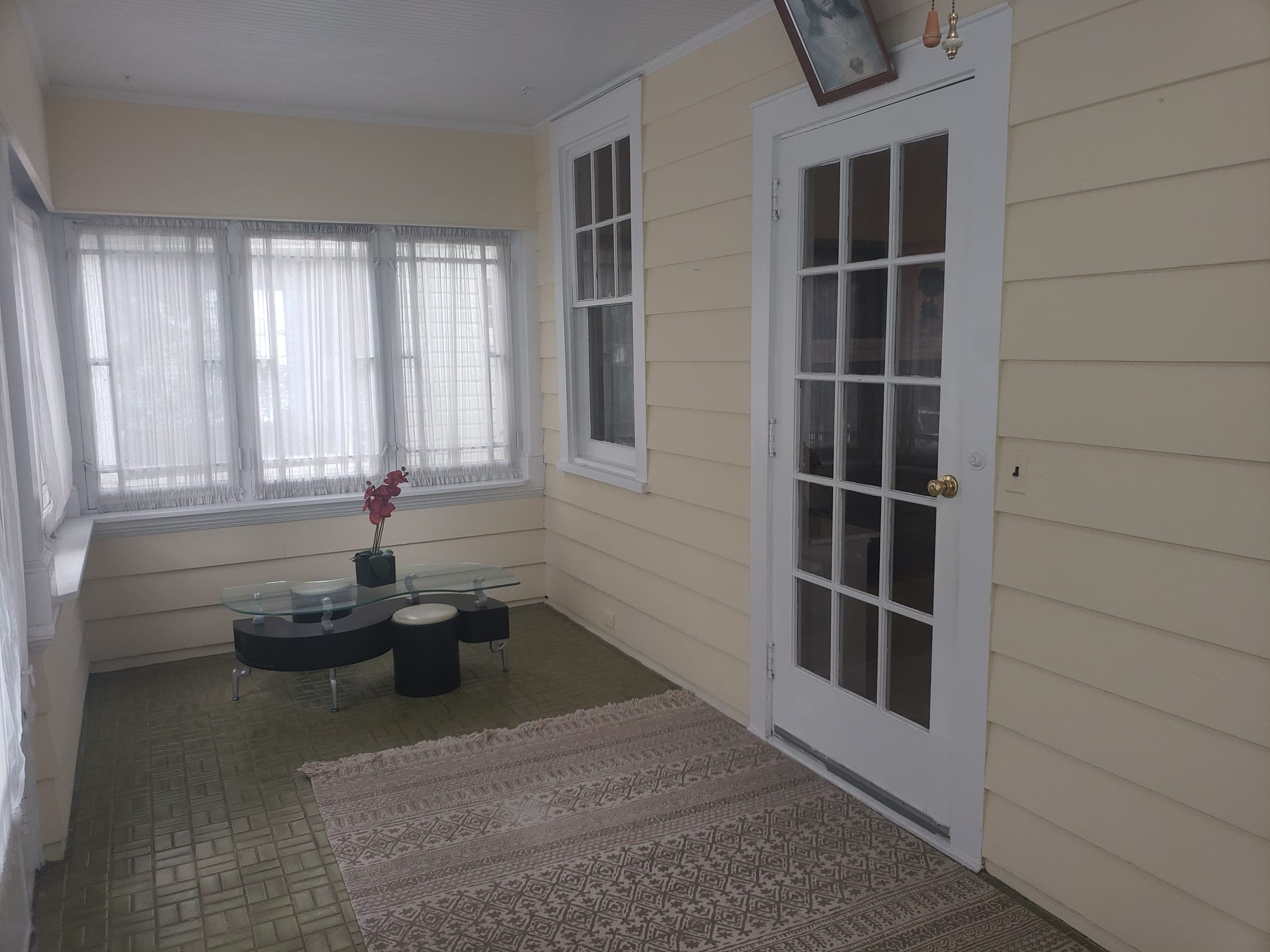 Langhorne Home Renovations — Langhorne residence — sunroom after flooring and paint refresh