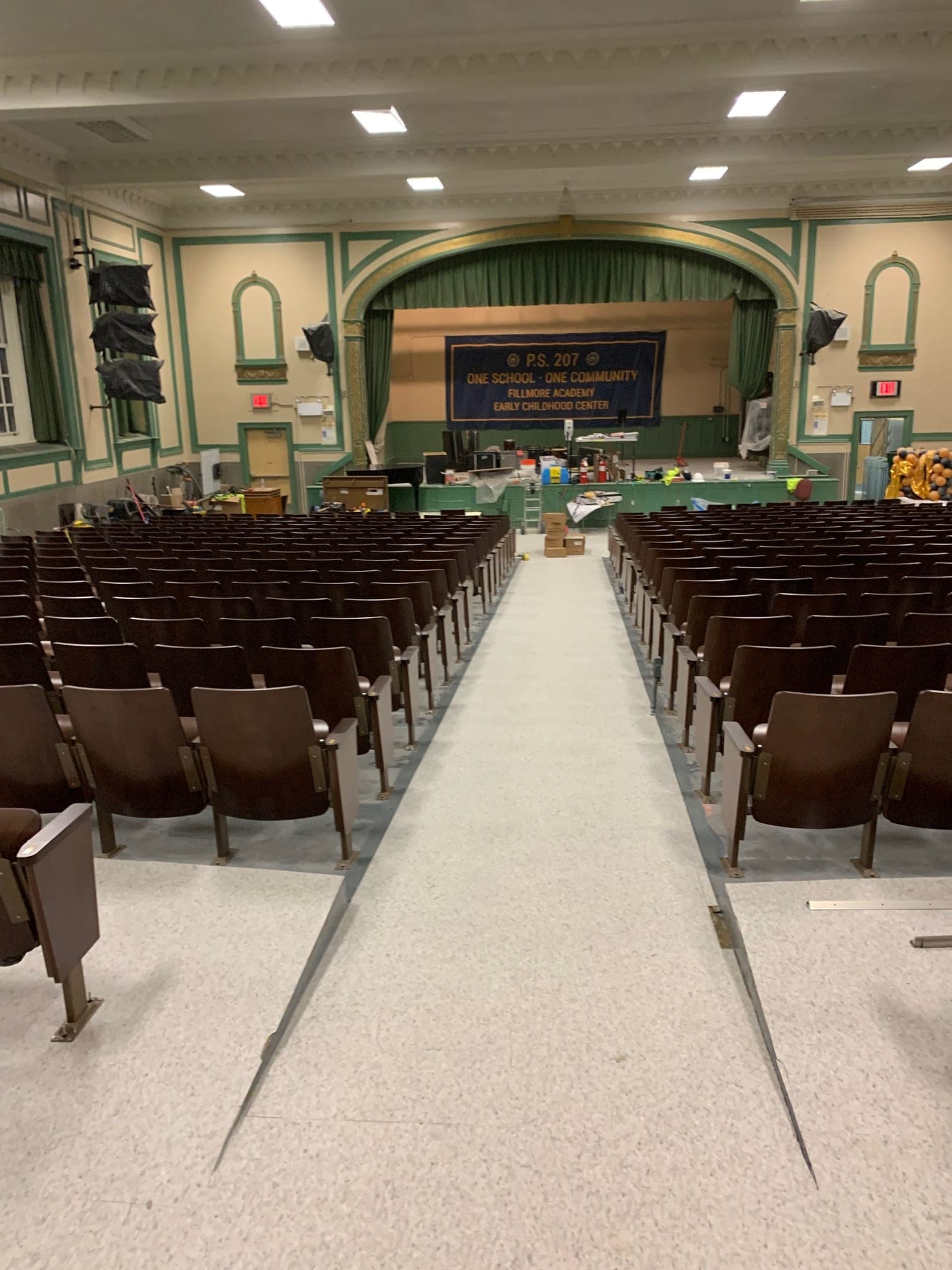 P.S. 207K — FY18 Reso A Auditorium Upgrade — P.S. 207K — completed auditorium looking toward the stage, with the P.S. 207 / Fillmore Academy banner